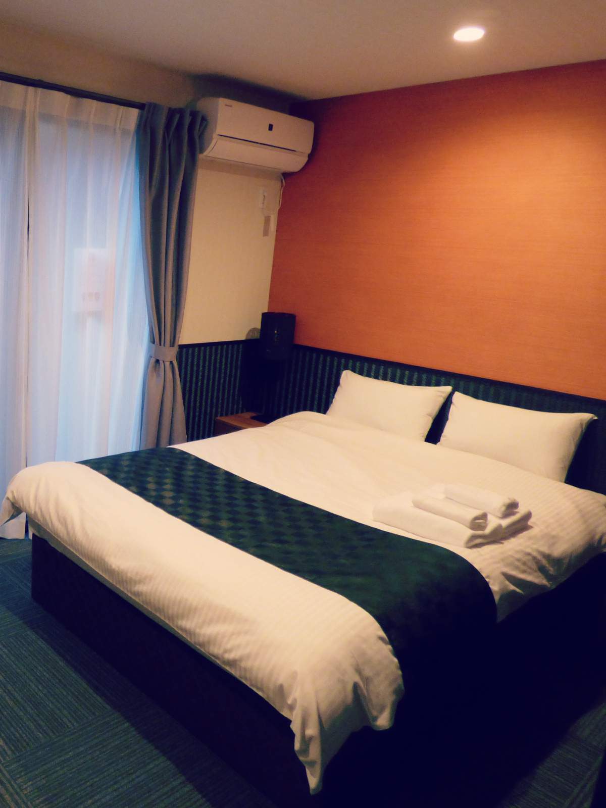A Western bed in a hotel in Japan