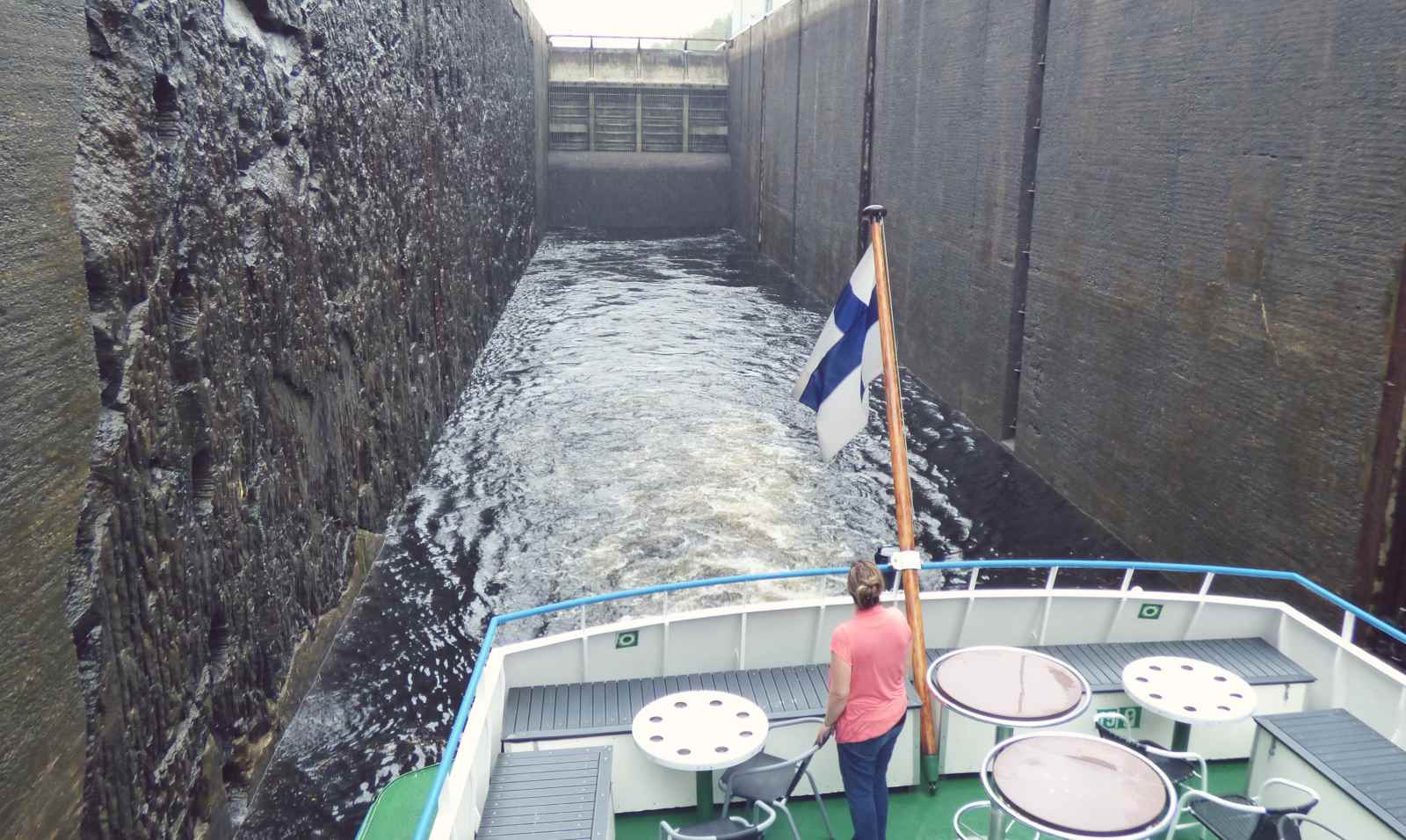 Blogger Paula at Saimaa Canal ferry in Finland looking at one of the locks