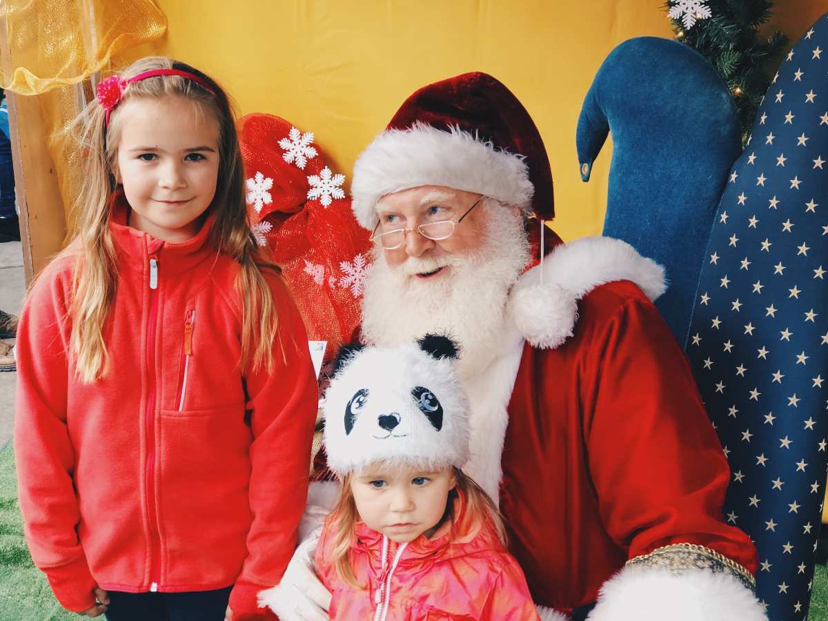 Our kids meeting Santa at German Holiday Market in Mountain View, California