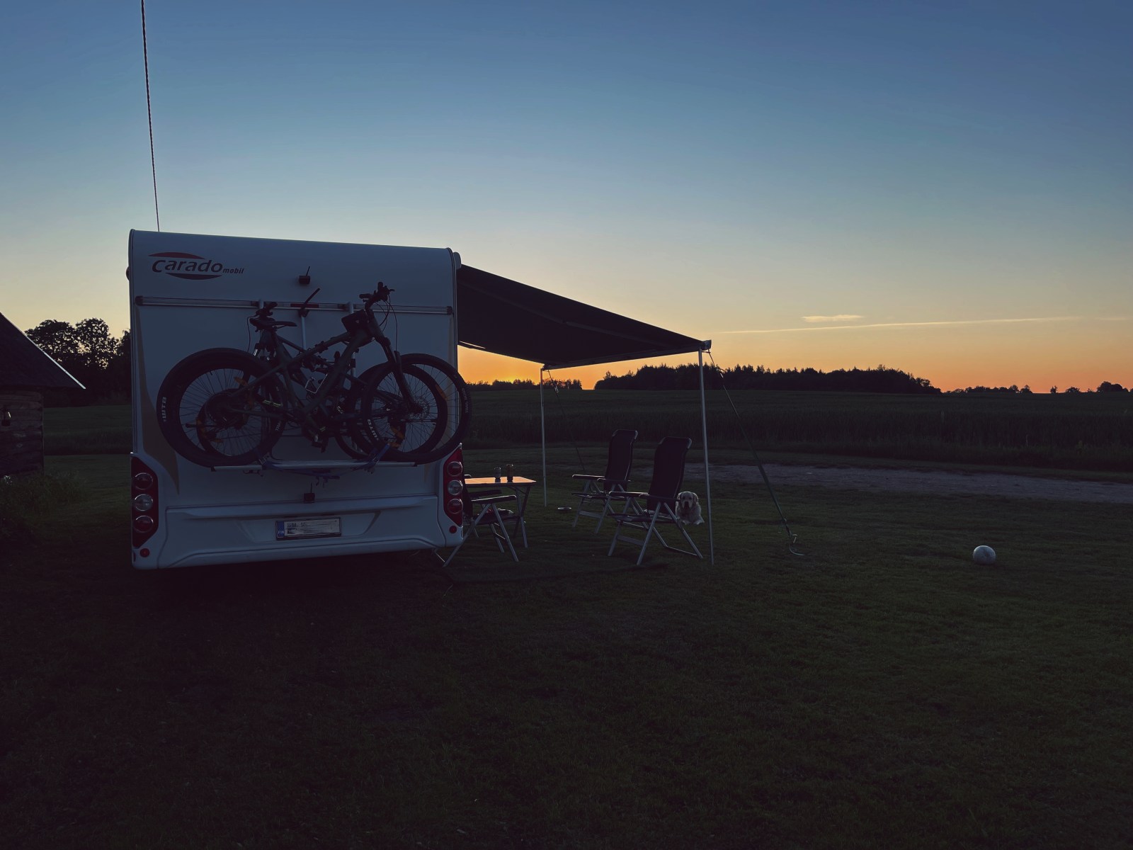 Camper in sunset