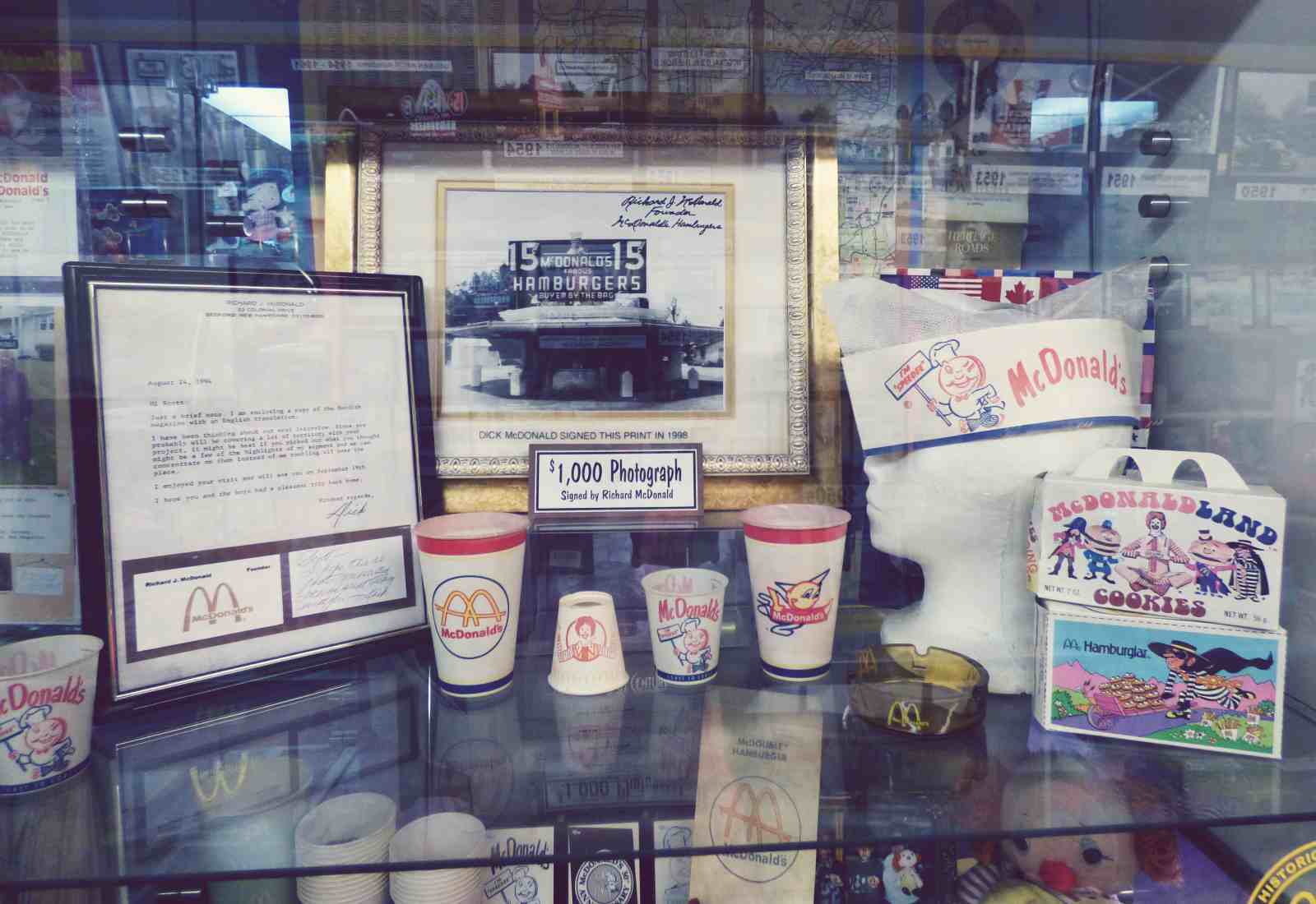 A picture of the original McDonald's signed by the founder Dick and his business card.
