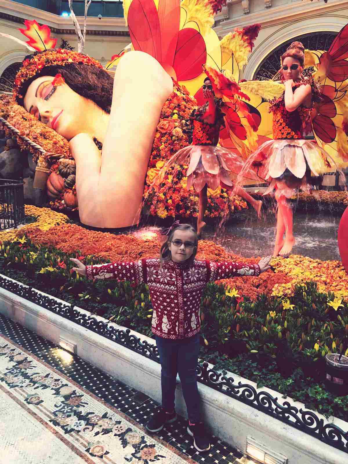Our daughter in front of amazing flower arrangements in Bellagio, Las Vegas.