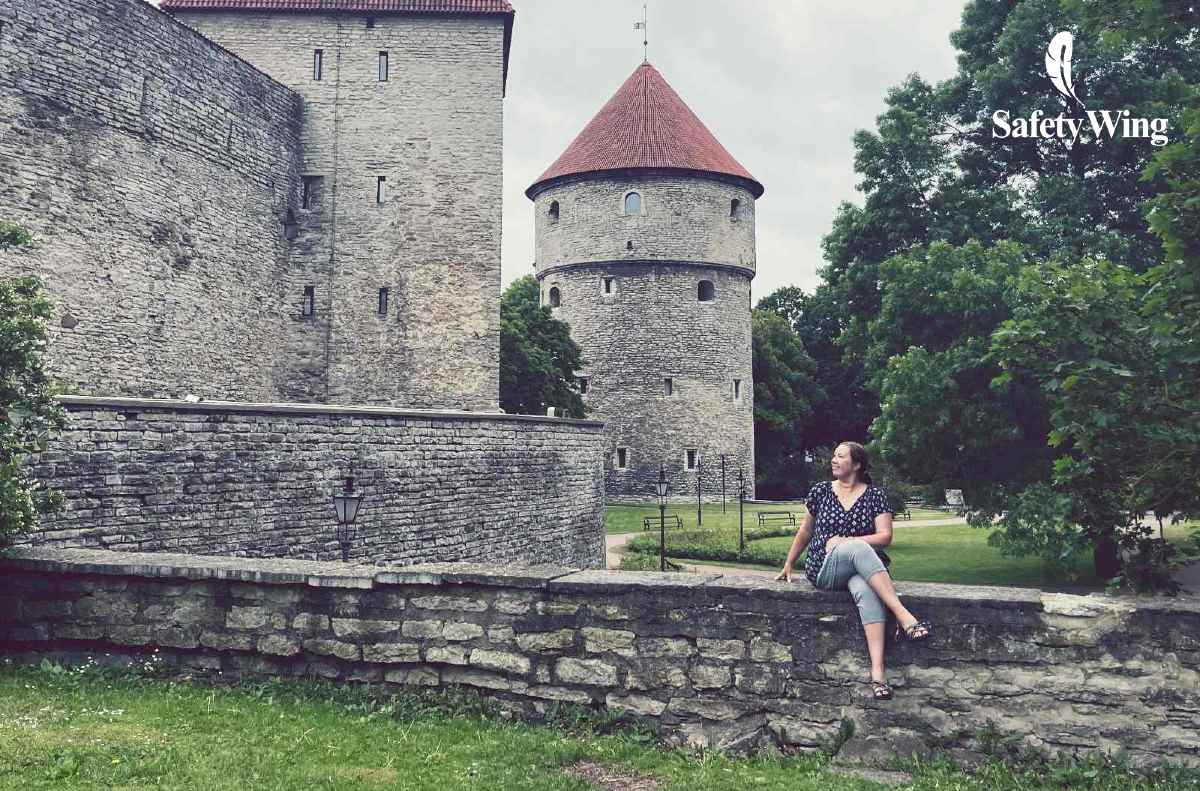 Blogger Paula sitting in Kiek de Kök wall in Tallinn, Estonia