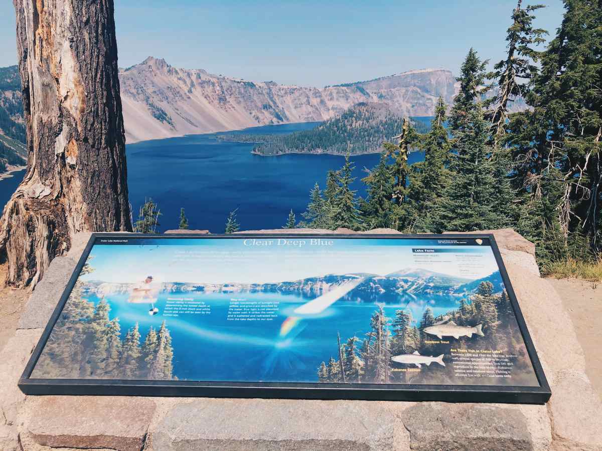 Crater Lake in Oregon and a sign in front of it